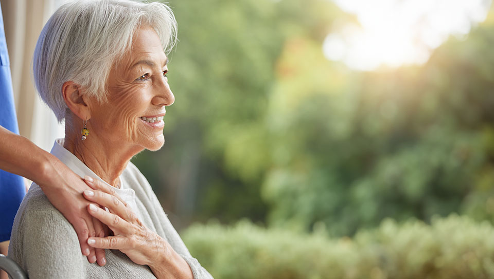 Woman smiling during stroke recovery